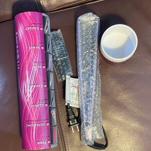 Pink Hair Styling Tool with Silver Accents